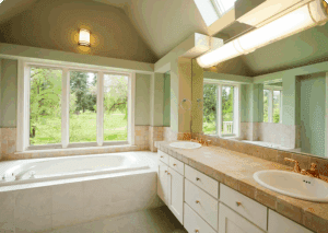 Bright bathroom featuring dual sinks
