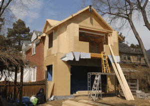 Partially built two-story house structure