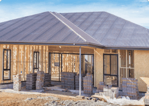 Incomplete house structure with wooden framework