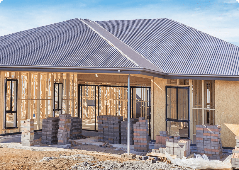 Incomplete house structure with wooden framework